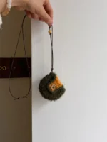 Crochet "Orange Soda" Earphone Pouch – Vintage Green & Orange Airpods Case - Image 4